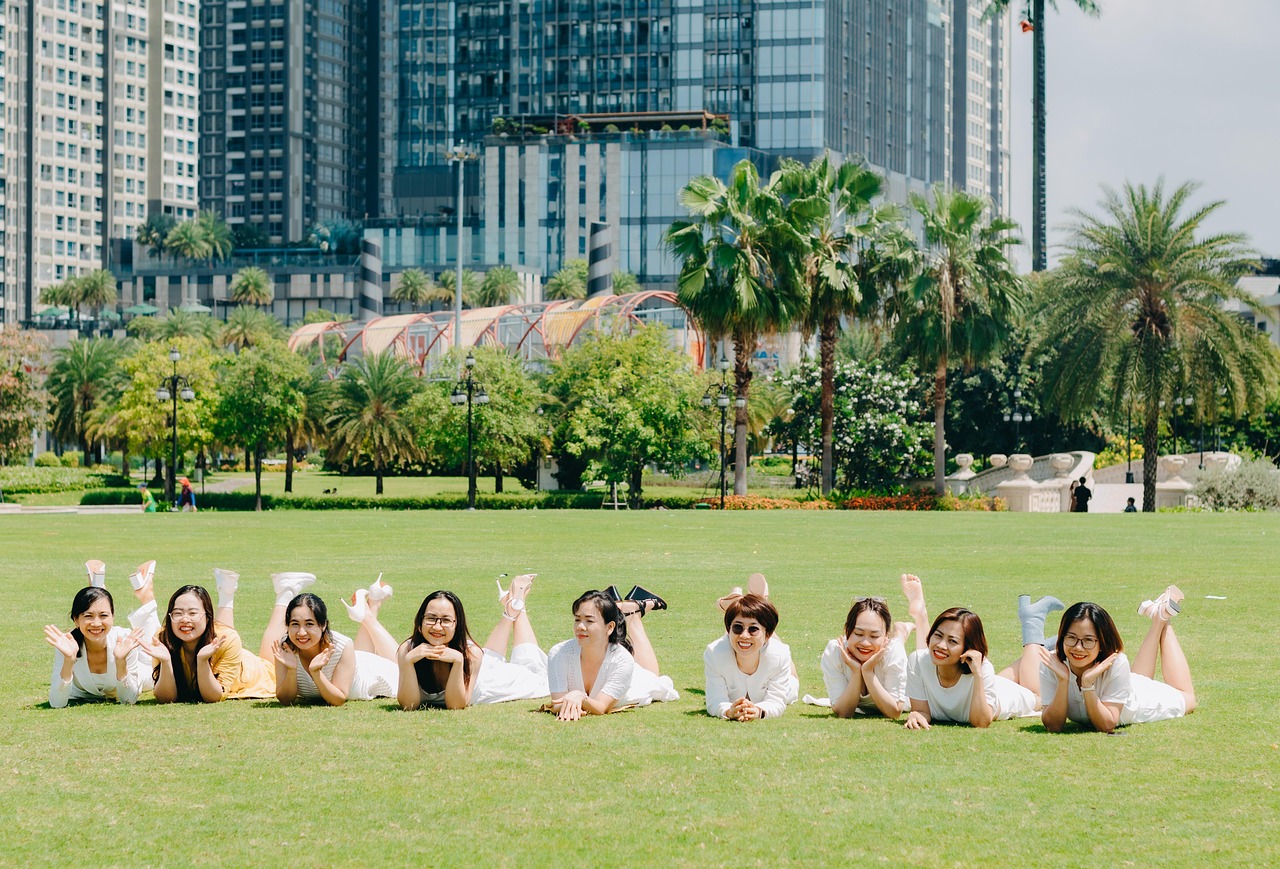 landscape, outdoor, park, green, person, white shirt, team, female, girl, beautiful, building, tall building, city